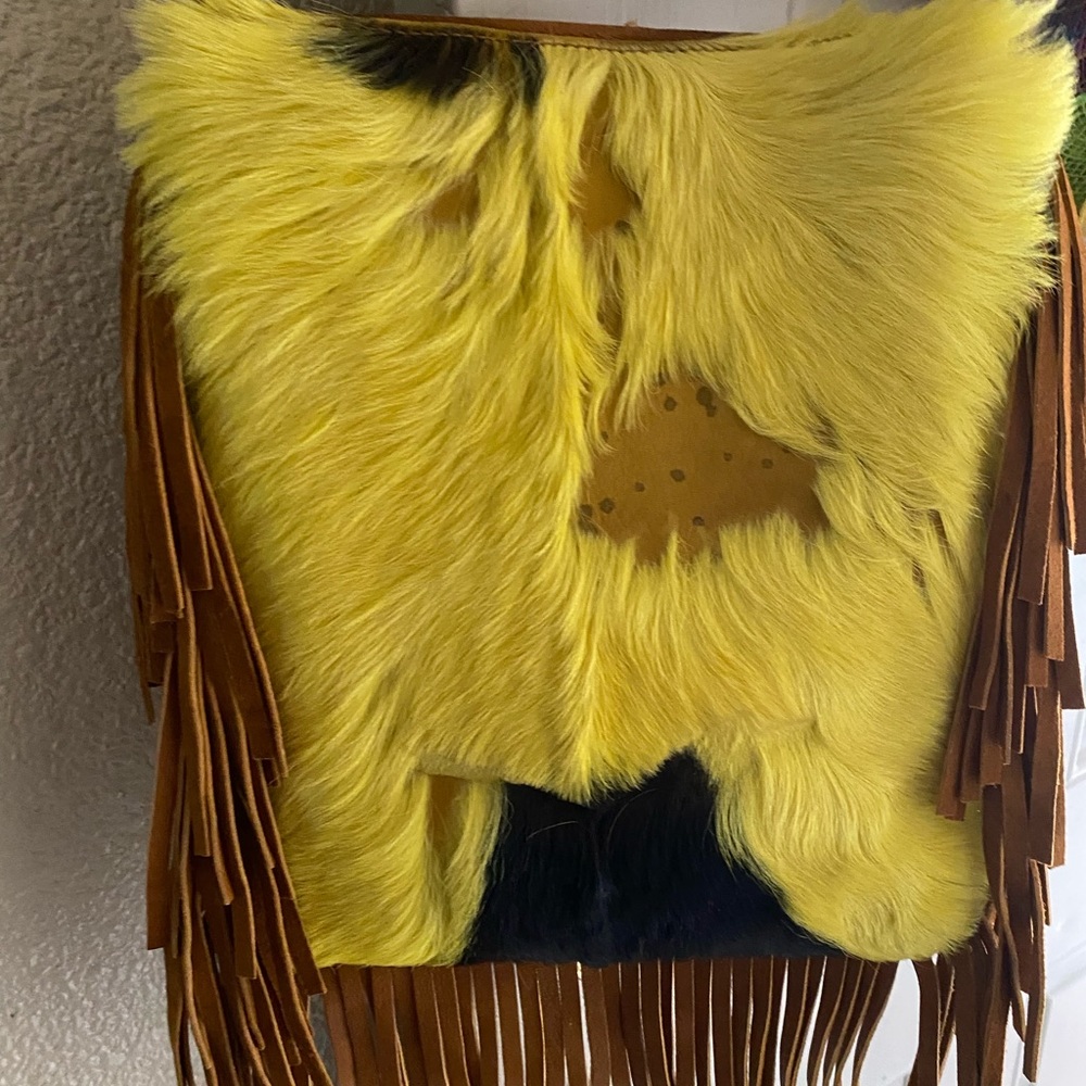 Custom made cowhide purse with real leather fringe and strap never used